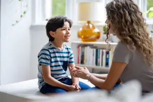 Mom talking to her son