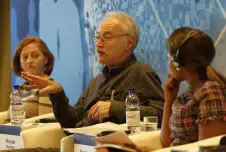 Three panelists having a discussion