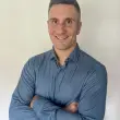 Headshot of Jason Mangone 