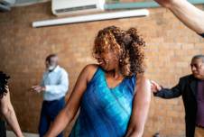 Older people having fun taking a dance class