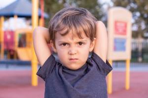 Angry boy on the playground