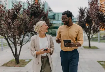 How a Work Buddy Can Improve Your Well-being and Your Workplace