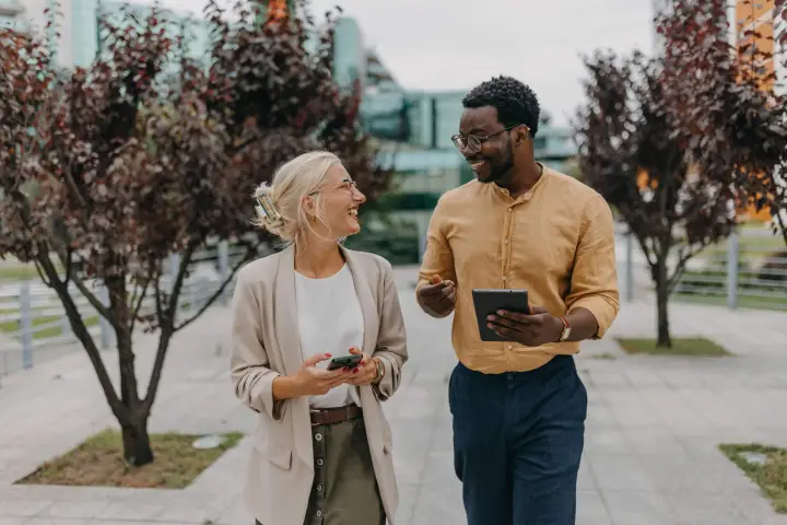 How a Work Buddy Can Improve Your Well-being and Your Workplace