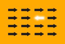 One arrow pointing in the opposite direction of many other arrows