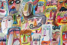 Drawing of lots of faces, all multicolored and diverse
